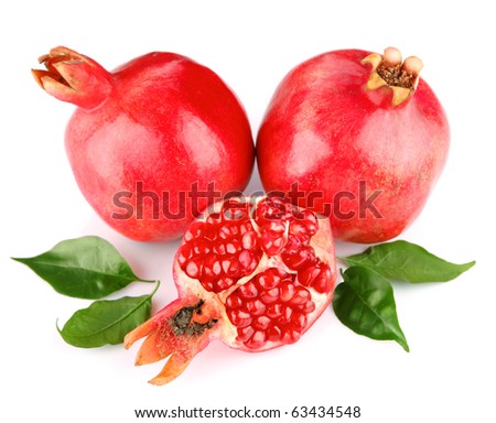 pomegranate fresh fruits with green leaves isolated on white background