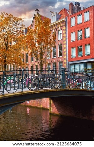 Similar – Image, Stock Photo Bridge over the Amstel river at night in Amsterdam