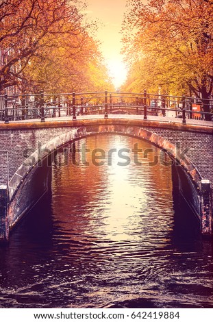 Similar – Image, Stock Photo Bridge over the Amstel river at night in Amsterdam