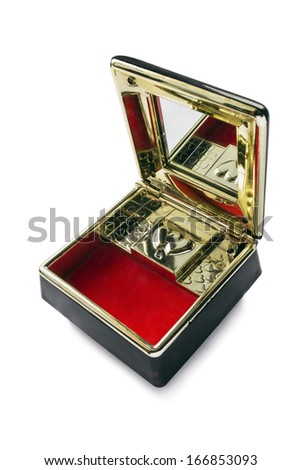 Opened empty music box with a mirror and red velvet inside