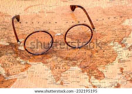 Glasses on a map of a world - Russia