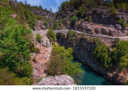 Koprulu Canyon. A view of Kopru River and Koprulu Canyon. National Park in the province of Antalya, south western Turkey. The canyon is crossed by the Roman Oluklu bridge. July 2020,long exposure shot Stok fotoğraf © 