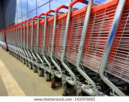 shopping carts lined up at supermarket