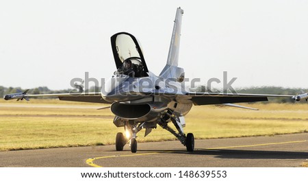 KECSKEMET, HUNGARY - AUGUST 3:Belgian F-16 fighter taxis for take off at airshow August 3, 2013 in Kecskemet