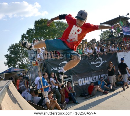 BELGRADE, SERBIA - CIRCA AUGUST 2012: Skater jumps over opsacle at extreme park, circa August 2012 in Belgrade