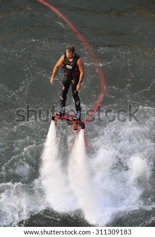 BELGRADE, SERBIA - CIRCA AUGUST 2015: The new spectacular sport, the fly board is showed on river Sava, circa August 2015 in Belgrade