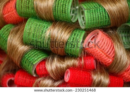 Blond hair during hair dressing with curlers