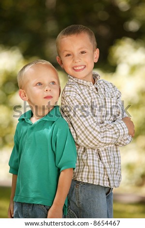 2 Young brothers outside