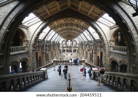 LONDON, UK - JUNE 20; Natural History Museum interior in London, United Kingdom - June 20, 2014; Famous London Natural History Museum big hall interior with tourists visitors