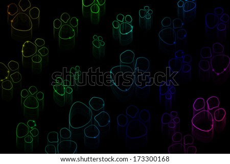 Neon animal tracks on a black background