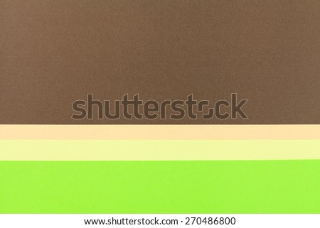 Color papers geometry flat composition background with green and brown tones