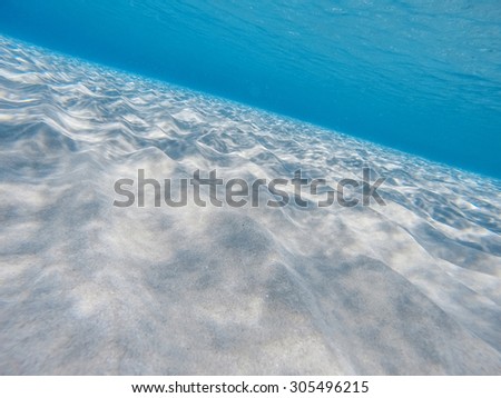De focused underwater sea background. Blue transparent turquoise water/De focused underwater background