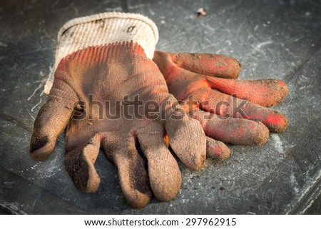 Dirty work gloves laying on the table