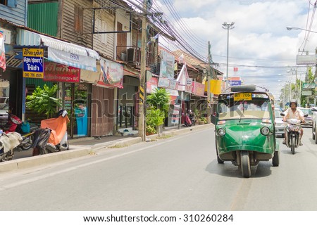 Ayutthaya Thailand - August 22: Auto rickshaw three-weeler tuk-tuk taxi driver   For services to tourists  around Ayutthaya city on Auguust 22 ,2015 ,Ayutthaya Thailand