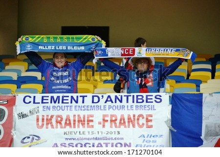 KIEV, UKRAINE - NOV 15: French fans in the stadium during the play-off match for the 2014 World Cup between Ukraine vs France, 15 November 2013, NSC Olympic Stadium, Kiev, Ukraine