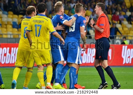 KIEV, UKRAINE - SEP 8: Football team Slovakia and Ukraine in the fight arguing with the referee during the match Ukraine 0-1 Slovakia UEFA Euro 2016 qualifier match, 8 September 2014, Kiev, Ukraine
