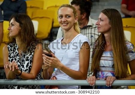 LVIV, UKRAINE - AUG 5: Ukrainian girl fans before the UEFA Champions League match between Shakhtar vs Fenerbahce, 5 August 2015, Arena Lviv, Lviv, Ukraine