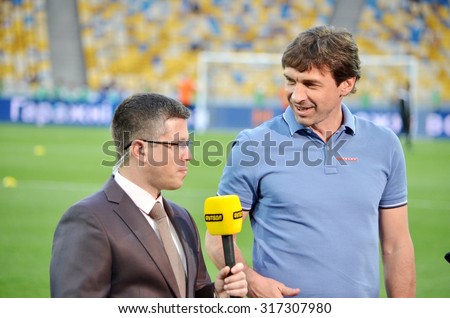 KIEV, UKRAINE - JUN 4: A journalist interviews Vashchuk during the final match Shakhtar vs Dynamo Kiev, 4 June 2015, NSC Olympic Stadium, Kiev, Ukraine