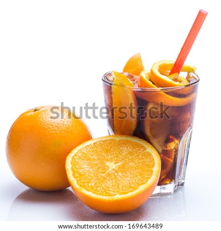 Cold cocktail with orange fruit over white background