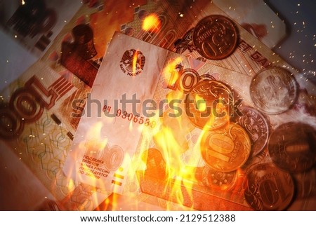 Background of burning russian rubles in fire flames 商業照片 © 