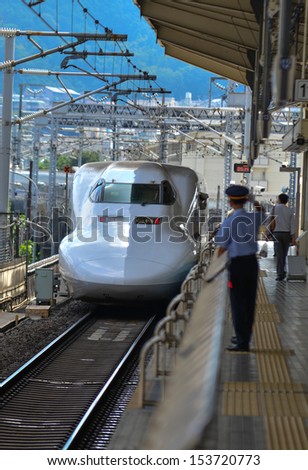 TOKYO, JAPAN Ã¢Â?Â? AUGUST 20  Bullet train is arriving into Tokyo station. These high speed trains reaching the speeds over 300Km/h. They are called Shinkansen