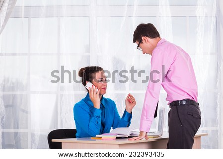 Young businesswoman at the hiring interview in the office.A woman manager looking at interview during conversation.Job interview.Job applicant having an interview