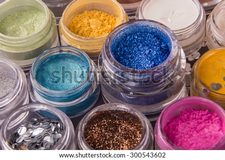 Glitter makeup and flouring. The concept of beauty and makeup