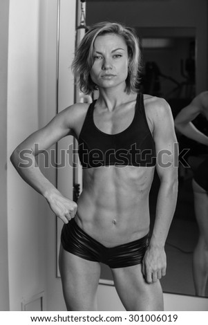 Athletic girl.muscular fitness woman, trained female body.healthy