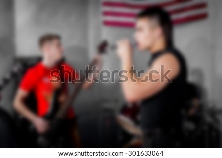 Rock musicians playing in the band. Musicians, art, music. Blurred background, abstract background. blurred picture