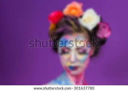 Makeup Artists, creative floral makeup, blurred picture. Blurring background.