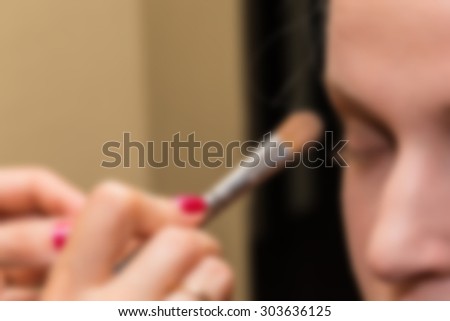 Work stylist and makeup artist. blurred Background