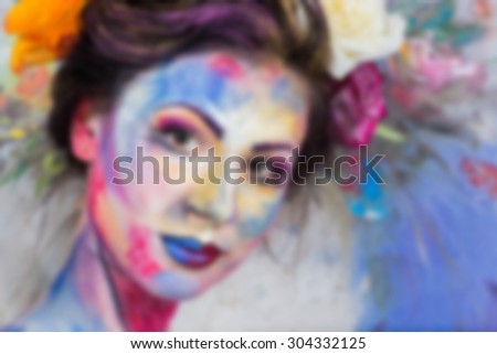 Beautiful, bright, creative makeup. blurred Background