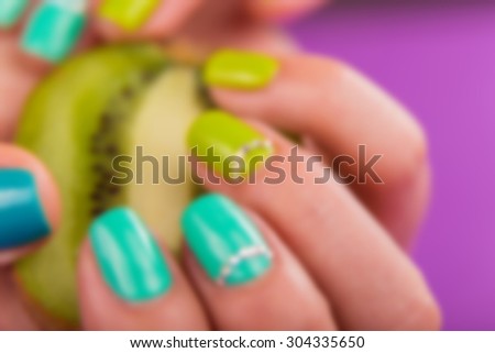 Bright manicure. blurred Background