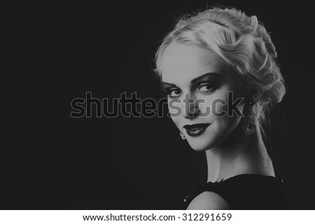 Beautiful blonde on a dark background. Portrait photo. A beautiful dress and accessories. Professional makeup. Beautiful model image lady 20s years.