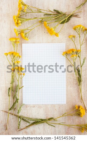 frame of wild flowers for writing, vertically