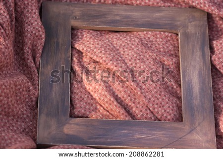 painted wooden frame on the matter in a small flower for vintage background