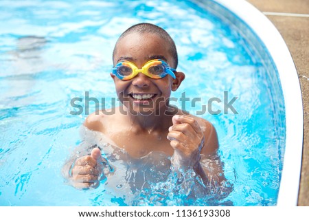 Similar – Image, Stock Photo Black boy swimming in pool