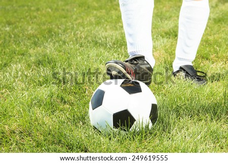 Portrait of young Asian girl with soccer ball