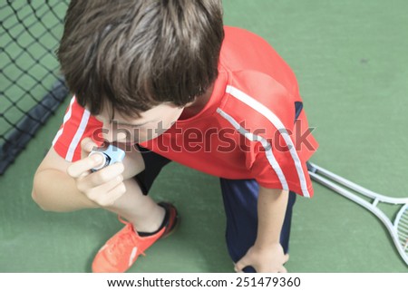 boy tennis player learning how to preparing to play tennis