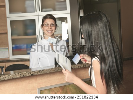 A dental assistance receptionist appointment at the dentist office