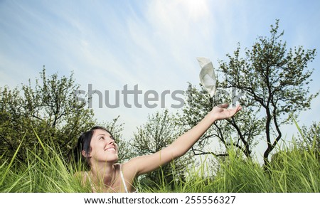 Woman sending handkerchief on the air