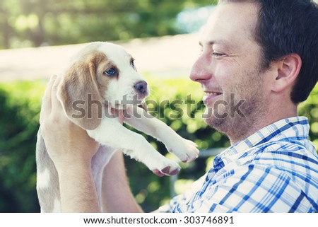 A dog and his owner outside
