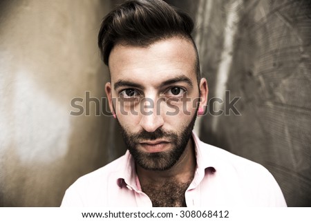A Portrait of young, depressed man in pain