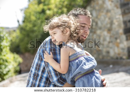 A Little Girl with is great father having fun