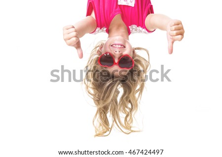 Little girl upside down 商業照片 © 