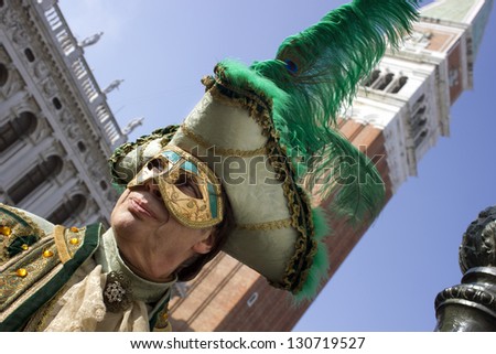 VENICE - FEBRUARY 10 - Undefined man wears traditional mask at the Carnival in Venice, Italy, on February 10, 2013. The last day of the Carnival of Venice on Piazza San Marco