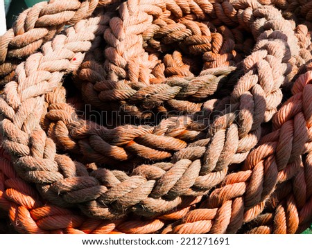 Detailed view of red rope, nautical background