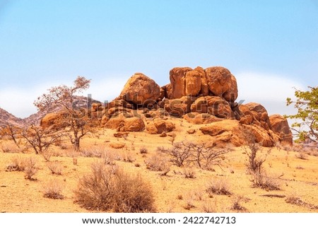 Similar – Image, Stock Photo Rocky formations near still lake