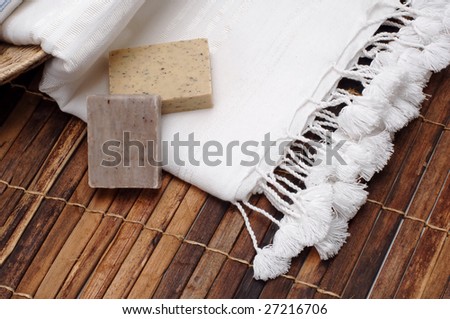 towel and soap at the bathroom floor