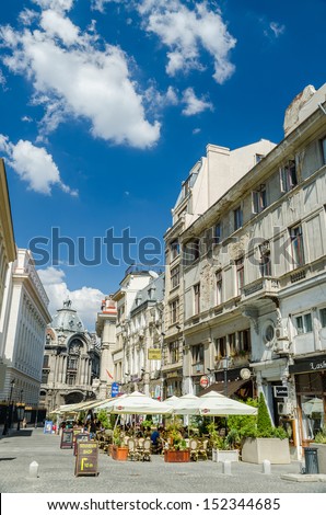 BUCHAREST, ROMANIA - SEPTEMBER 01: People enjoy the first day of autumn downtown Lipscani Street on September 01, 2013 in Bucharest, Romania. Lipscani is one of the most busiest streets of Bucharest.